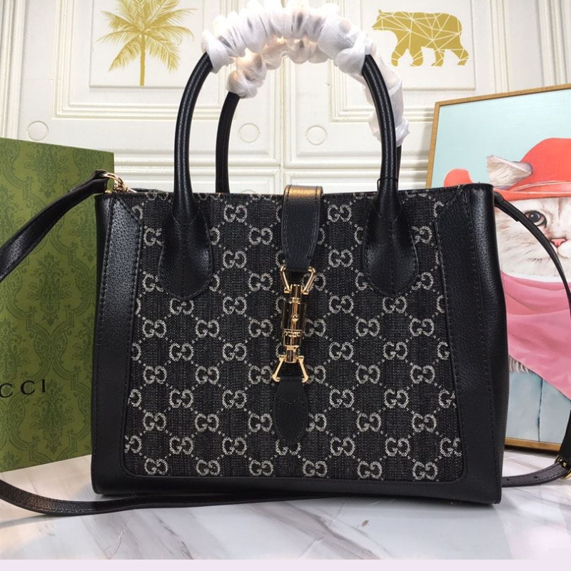 G*u*i shopping bags